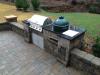 Outdoor grill cabinet