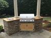 Outdoor grill cabinet
